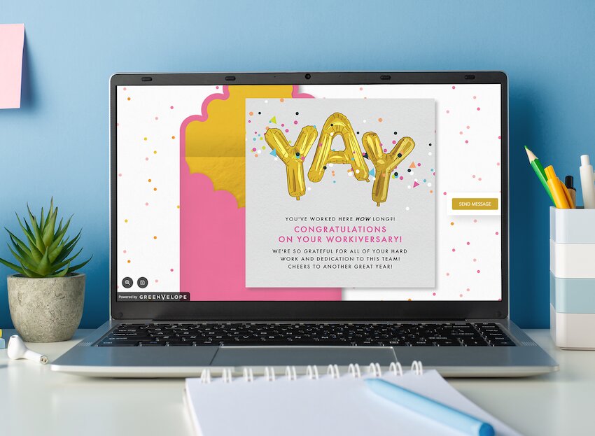 Happy workiversary: Confetti Celebration Card on a laptop screen